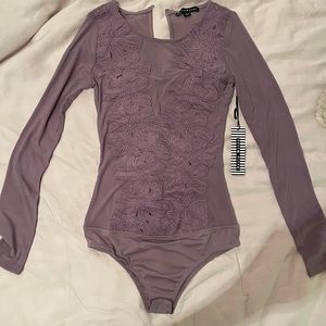 NWT!! Light purple sexy bodysuit!! Size small